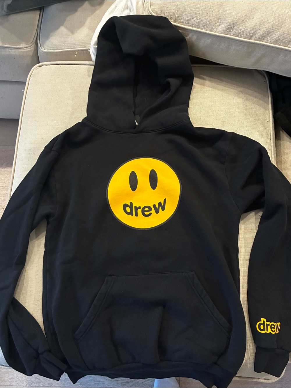 DREW Black Hoodie with Yellow Smiley Logo